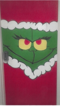 Staff decorate retirement lodge and nursing home doors for holiday